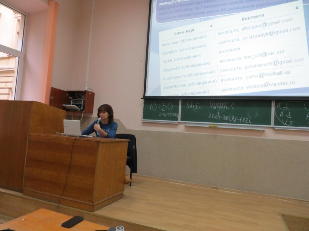 a woman in a classroom - File:WikiConference 2015 Lviv - Article Writing Contests 19.JPG